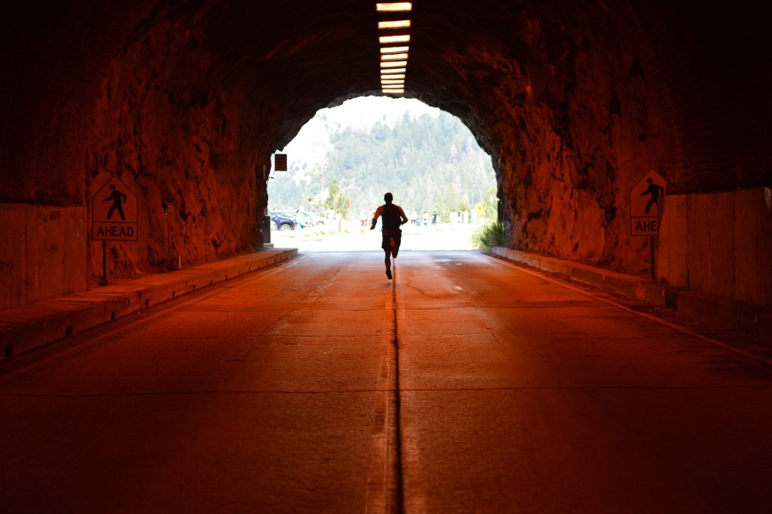 Free photo of Man Running in Tunnel