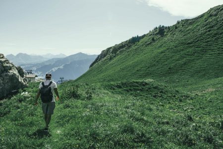 Hiking Green Hills of the Swiss Alps Free Stock Photo