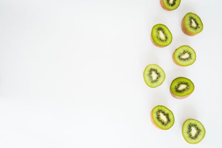 Sliced Kiwi Fruit on White Background Free Stock Photo