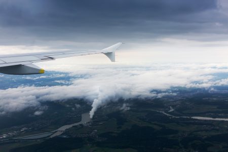 Airplane Above Clouds Free Stock Photo