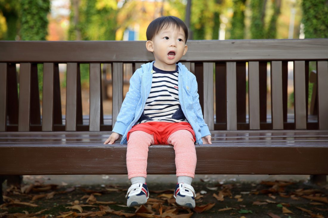 Free photo of Baby Boy on Bench