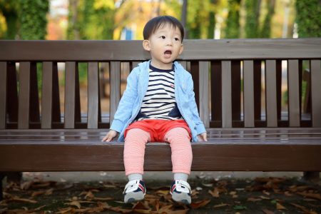 Baby Boy on Bench Free Stock Photo