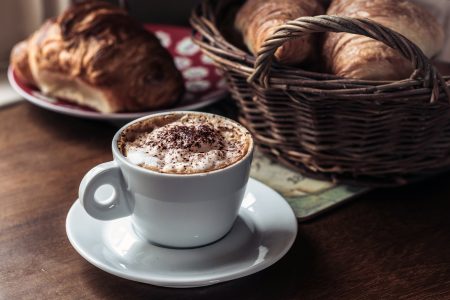 Frothy Coffee & Croissant Free Stock Photo