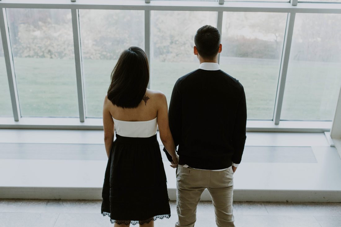 Free photo of Couple by Windows