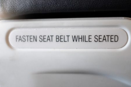 Fasten Seat Belt Sign on Plane Free Stock Photo