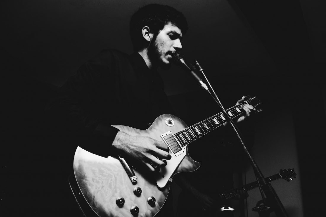Free photo of Guitar Man