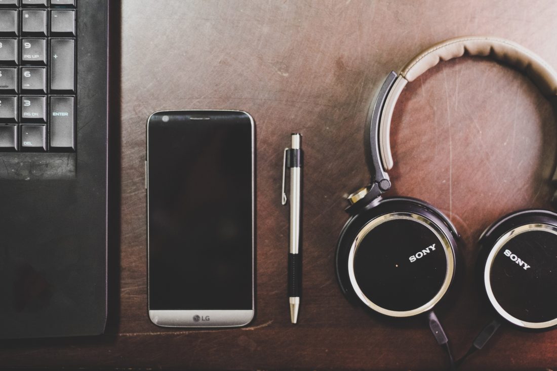 Free photo of Laptop, Pen, Mobile and Music Headphones
