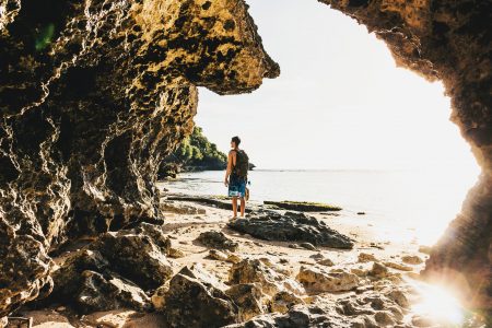 Man on Cave Beach