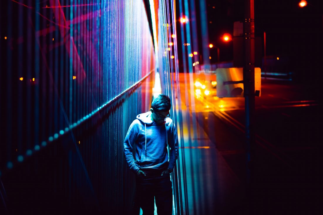 Free photo of Man in City Lights