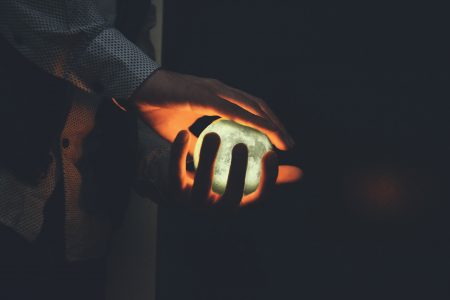 Man Holding Glowing Orb Free Stock Photo
