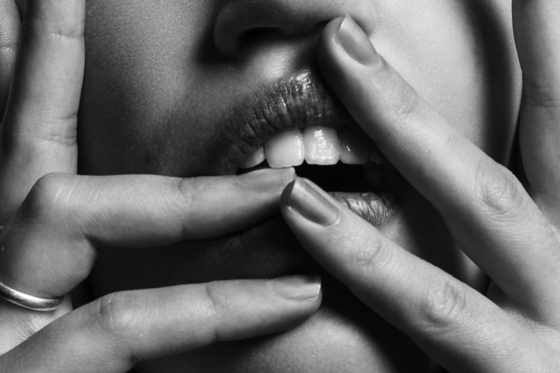 Free photo of Female Mouth and Fingers