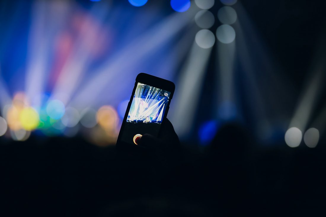Free photo of Using Phone at Music Concert