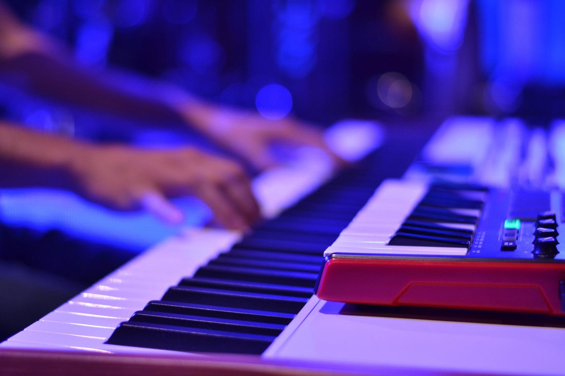 Free photo of Person Playing Keyboard