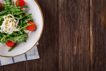 Salad on Wood Table Background