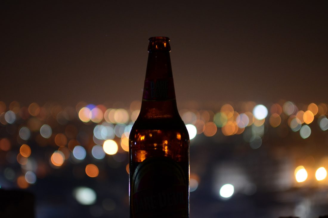 Free photo of Beer Bottle in City