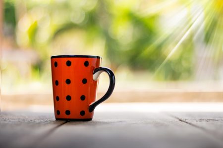 Coffee Cup in Garden Free Stock Photo