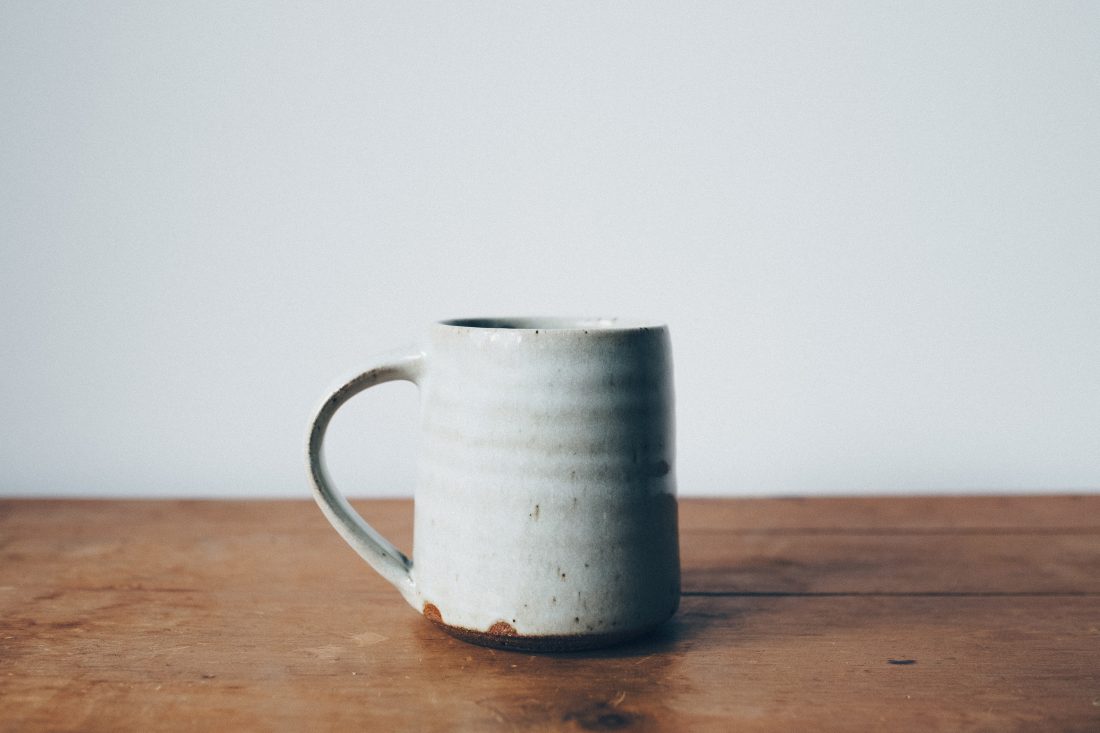 Free photo of Rustic Coffee Mug on Wooden Table