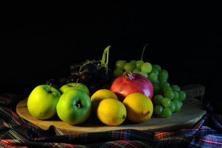 Platter of Fruit with a Black Background Free Stock Photo