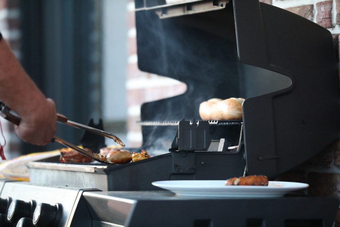 Free photo of Man Cooking on BBQ