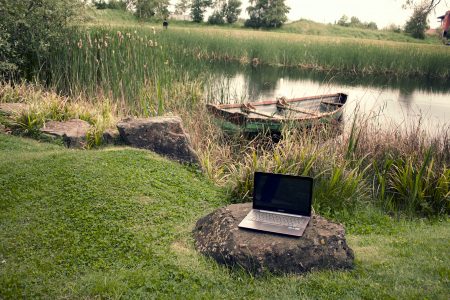 Laptop on Lake Free Stock Photo