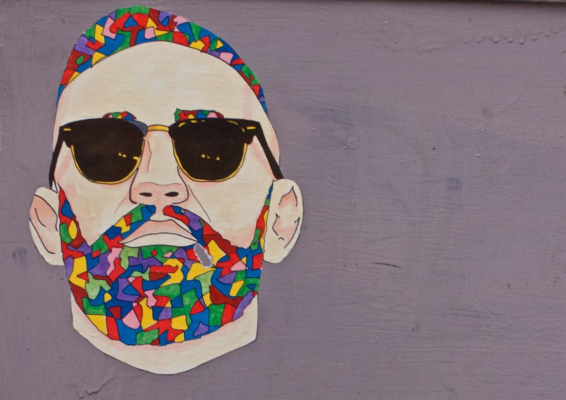 Free photo of Colorful Street Art Man Sunglasses