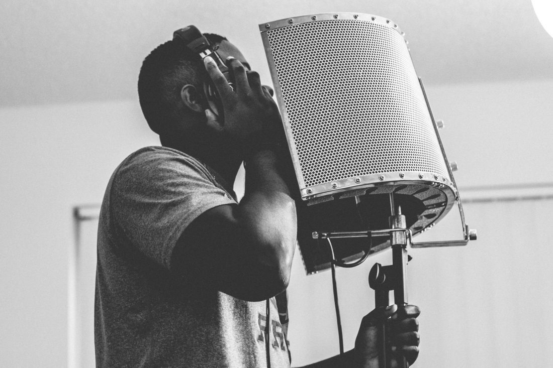 Free photo of Man Singing in Music Studio