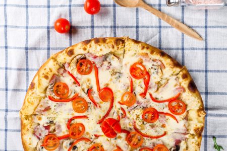Pizza on Table Cloth Free Stock Photo