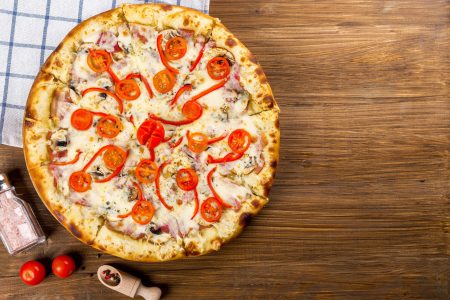 Pizza on Wood Table Free Stock Photo