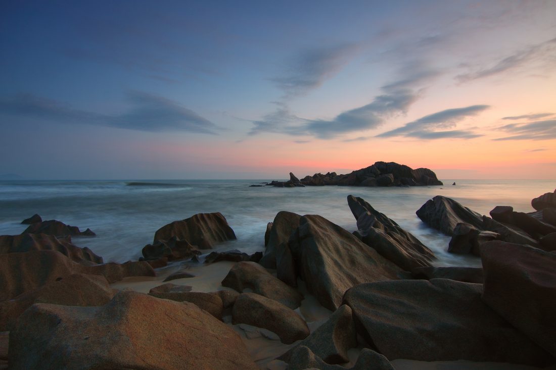 Free photo of Rocks & Beach at Sunset