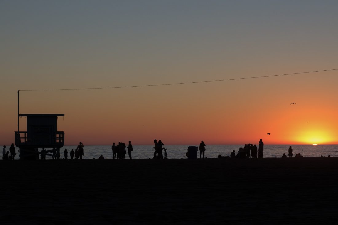 Free photo of Computer & Beach Sunset