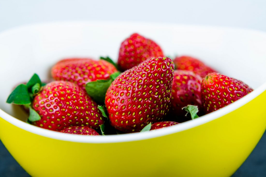 Free photo of Strawberries in Yellow Bowl