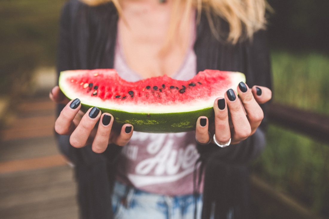 Free photo of Woman Holding Watermelon Fruit