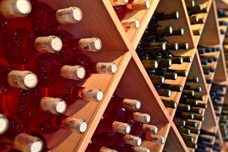 Wine Bottles on Rack Free Stock Photo