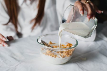 Woman with Breakfast Cereal Free Stock Photo
