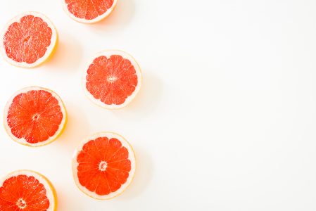Sliced Tangerine on White Background Free Stock Photo