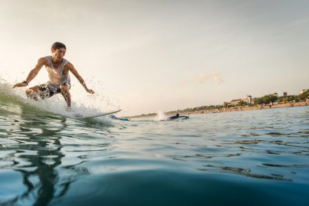 Surfer Riding the Wave Free Stock Photo