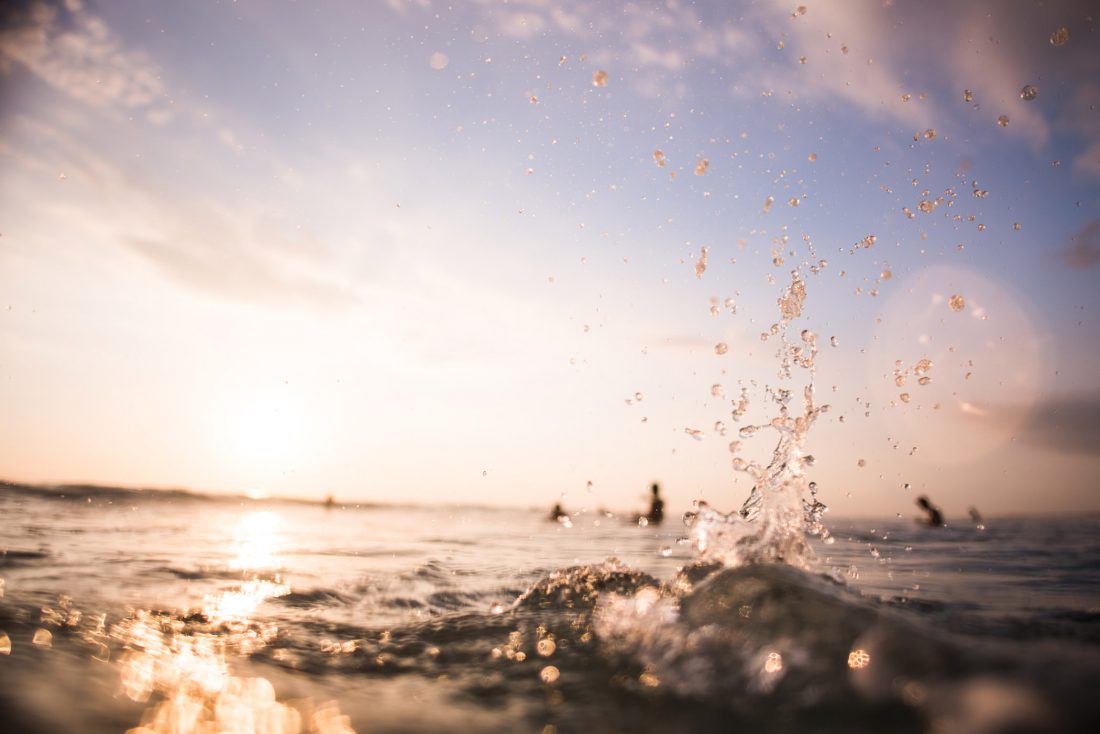 Free photo of Surfers Splashing Water Waves