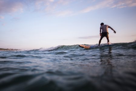 Man Surfing Waves