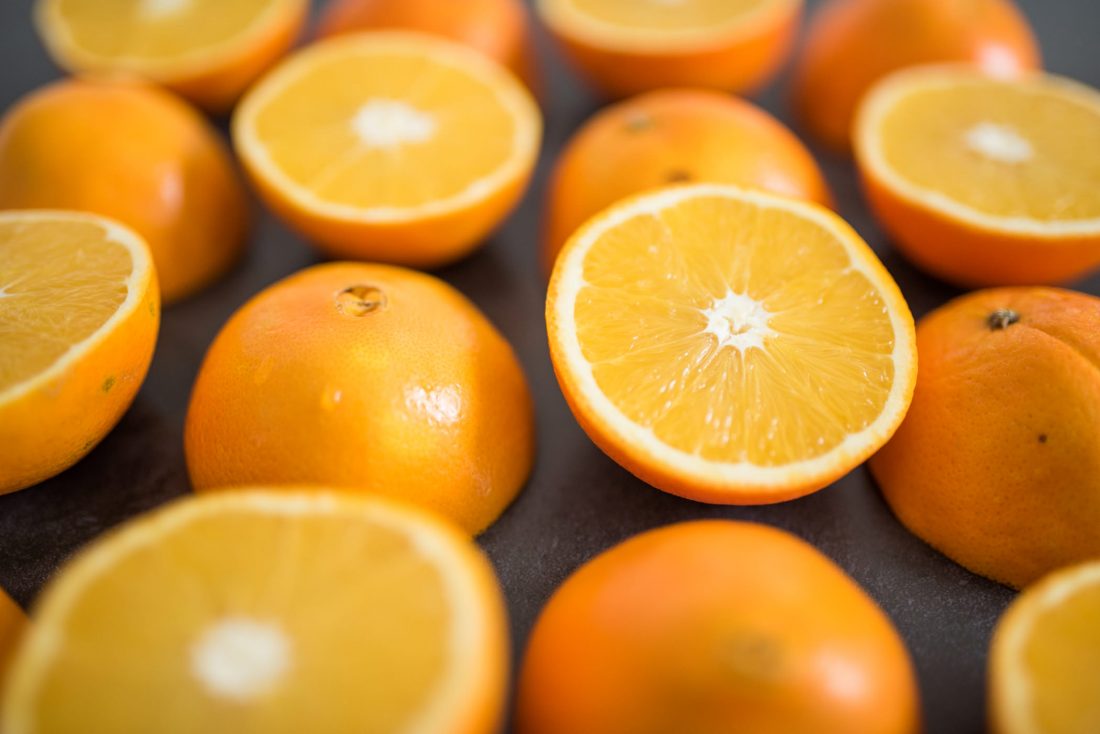 Free photo of Sliced Oranges on Table
