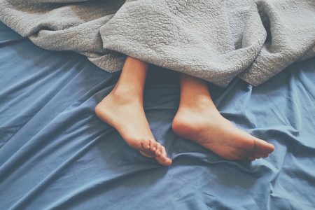 Sleeping Feet in Bed Free Stock Photo