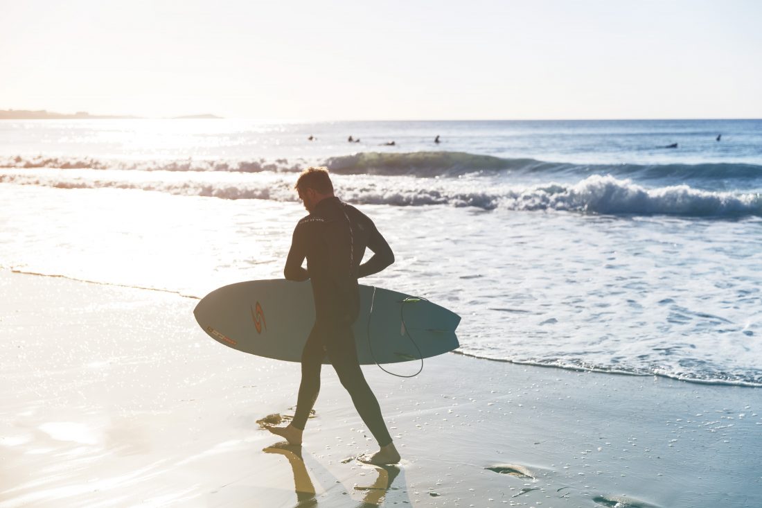 Free photo of Surfer on Beach