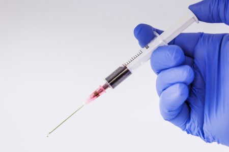 Syringe with Blood Free Stock Photo