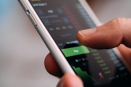 Trading Cryptocurrency on Mobile Web Free Stock Photo