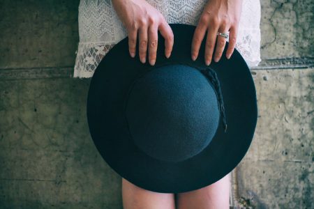 Woman Holding Hat Free Stock Photo