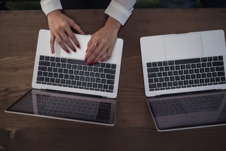 Hands Typing on Laptop Free Stock Photo