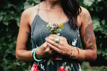 Woman Holding Flowers Free Stock Photo