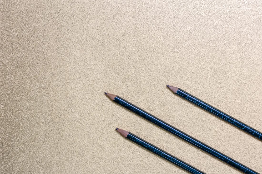 Free photo of Pencils Gold Paper