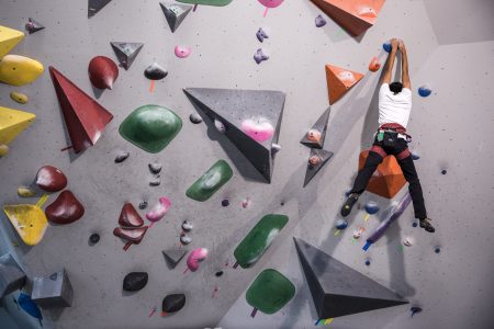 Indoor rock climber Free Stock Photo