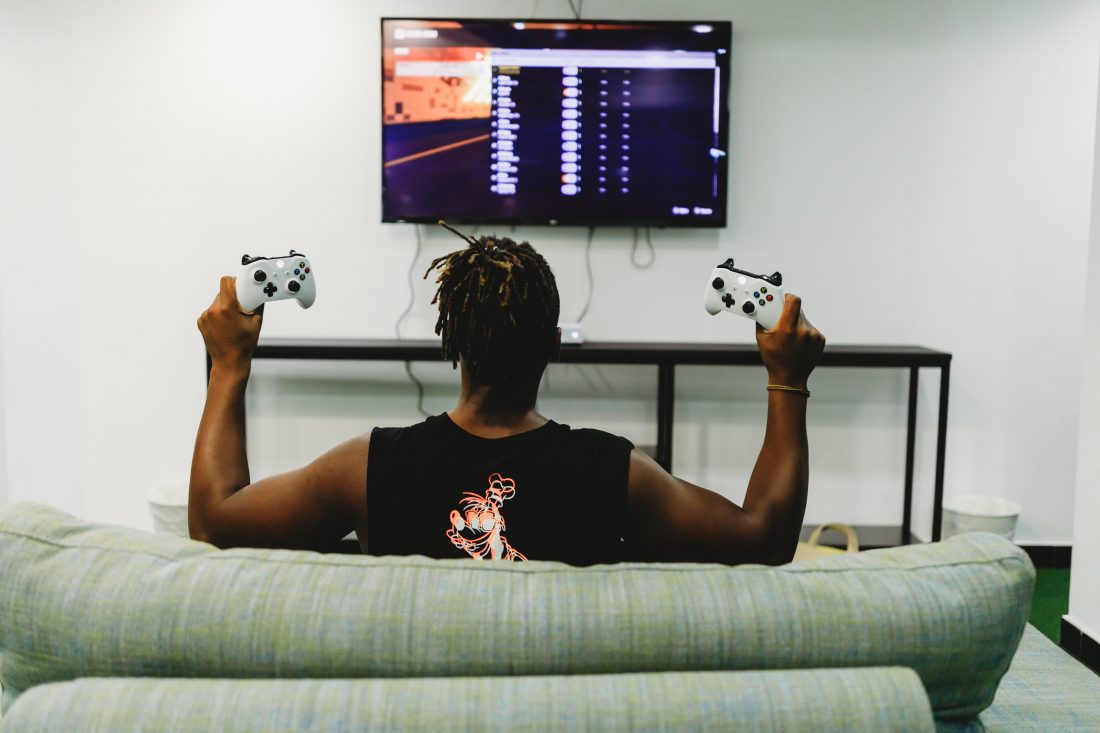 Free photo of Man playing video game