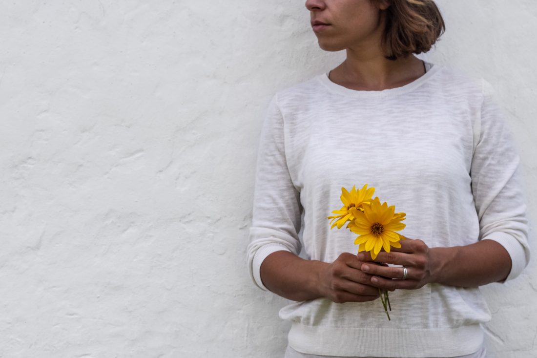 Free photo of Woman Holding Flowers